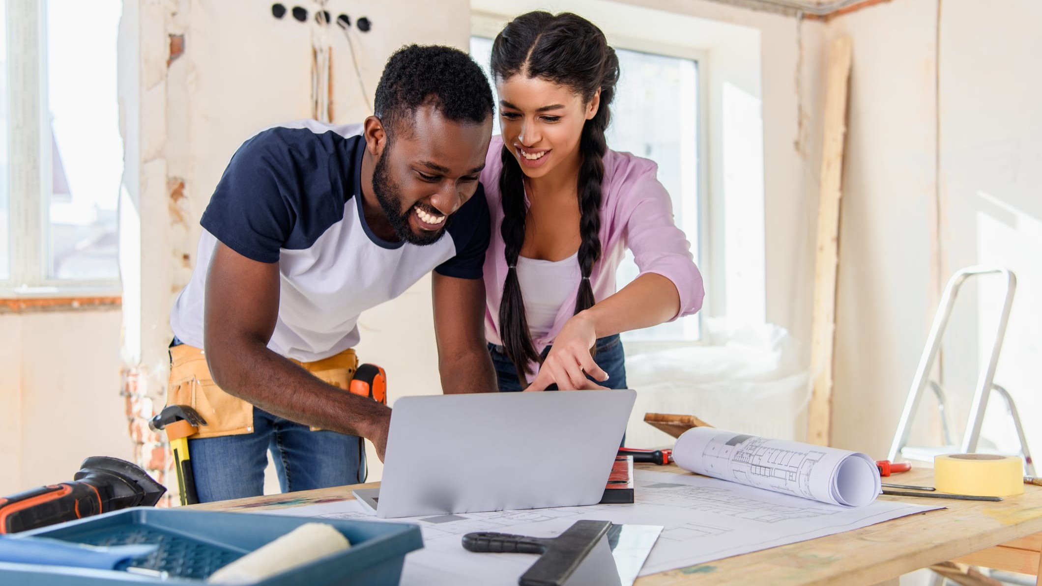 A man and a woman making improvements to a property that they own. How will the improvements made impact the properties value?