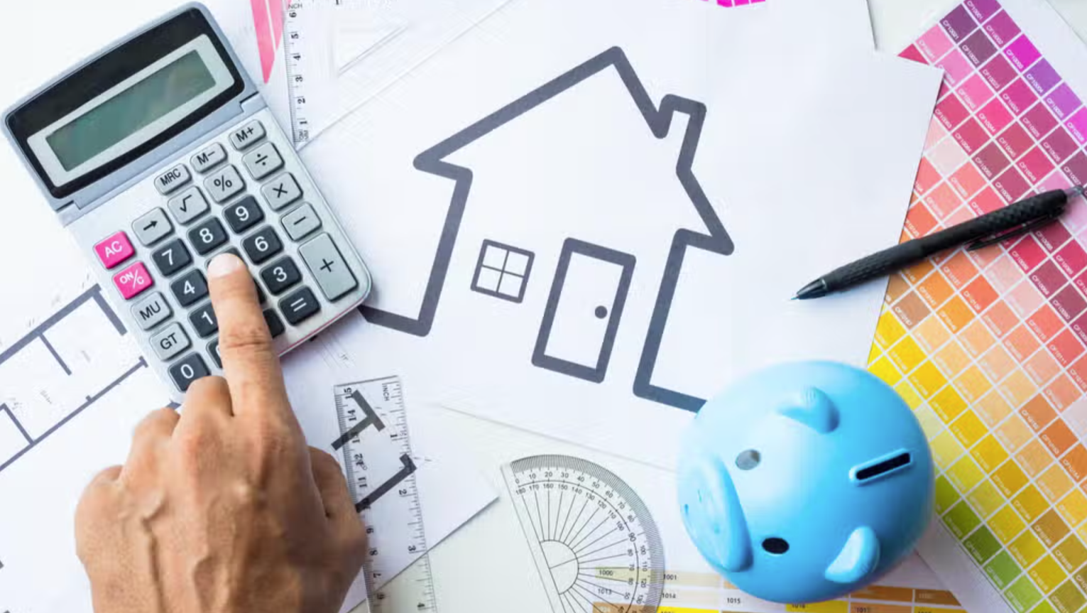 A calculator being used to calculate the value of a property.