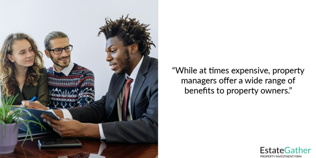 Image showing a property manager talking to a married couple that owns a property. Text reads "while at times expensive, property managers offer a wide range of benefits to property owners."