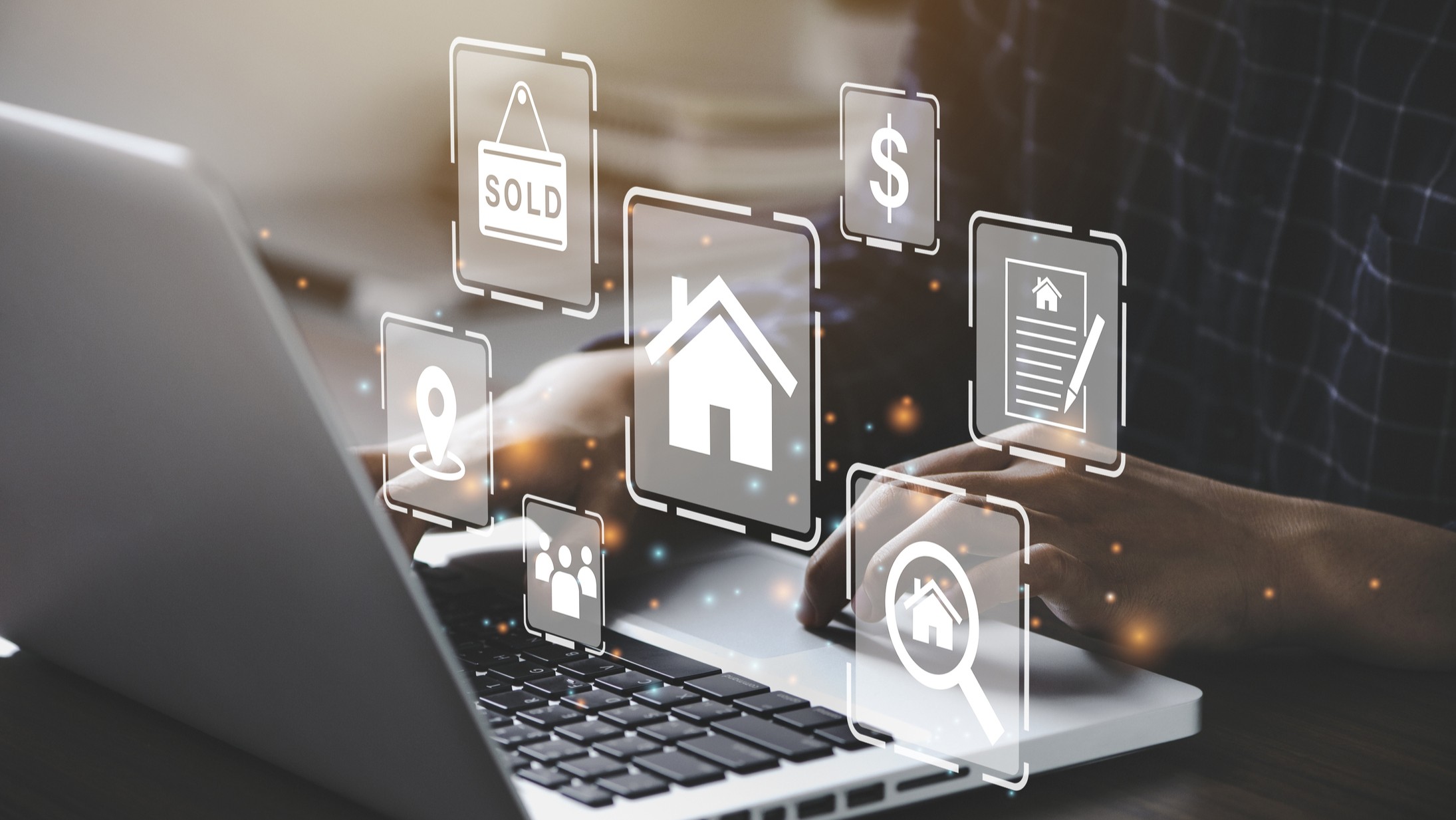 A computer being used to calculate the capitalization rate of a property.