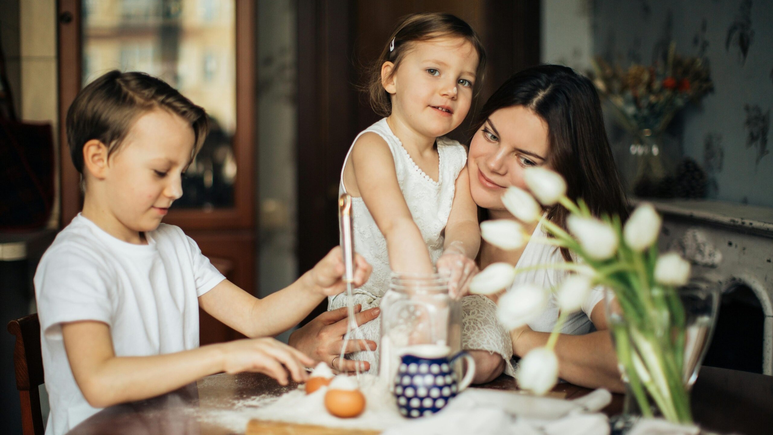 A family enjoying their new home purchased with a loan requiring Mortgage Insurance Premiums.